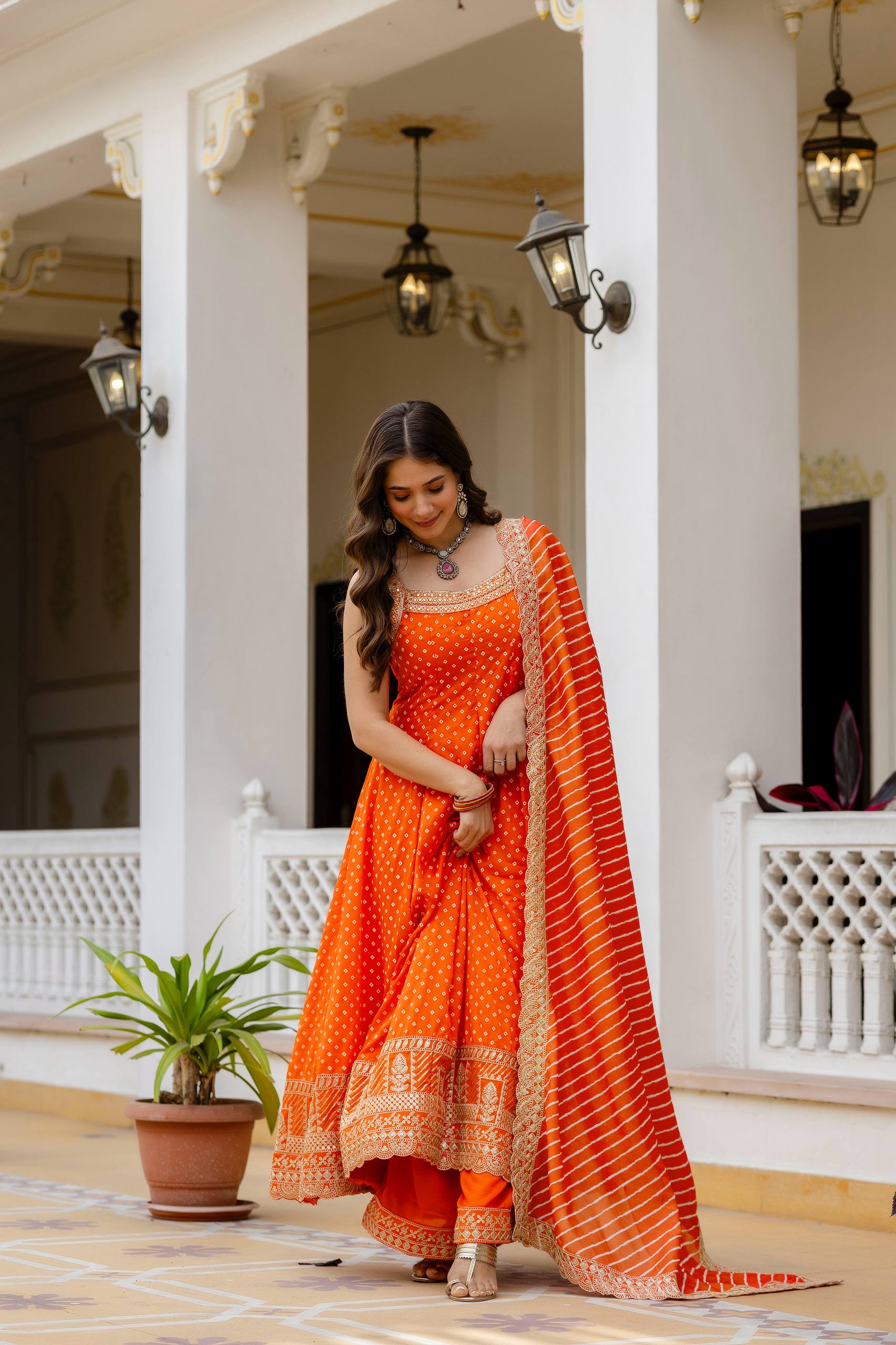 Bright Orange Bandhani Vichitra Silk Embroidered Gown Set with Real Mirror Work & Leheriya Dupatta