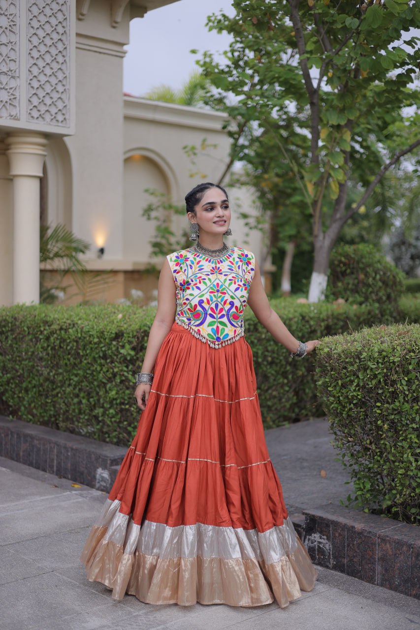 Terracotta Orange Kutchi Work Lehenga Choli with 12 Meter Flair