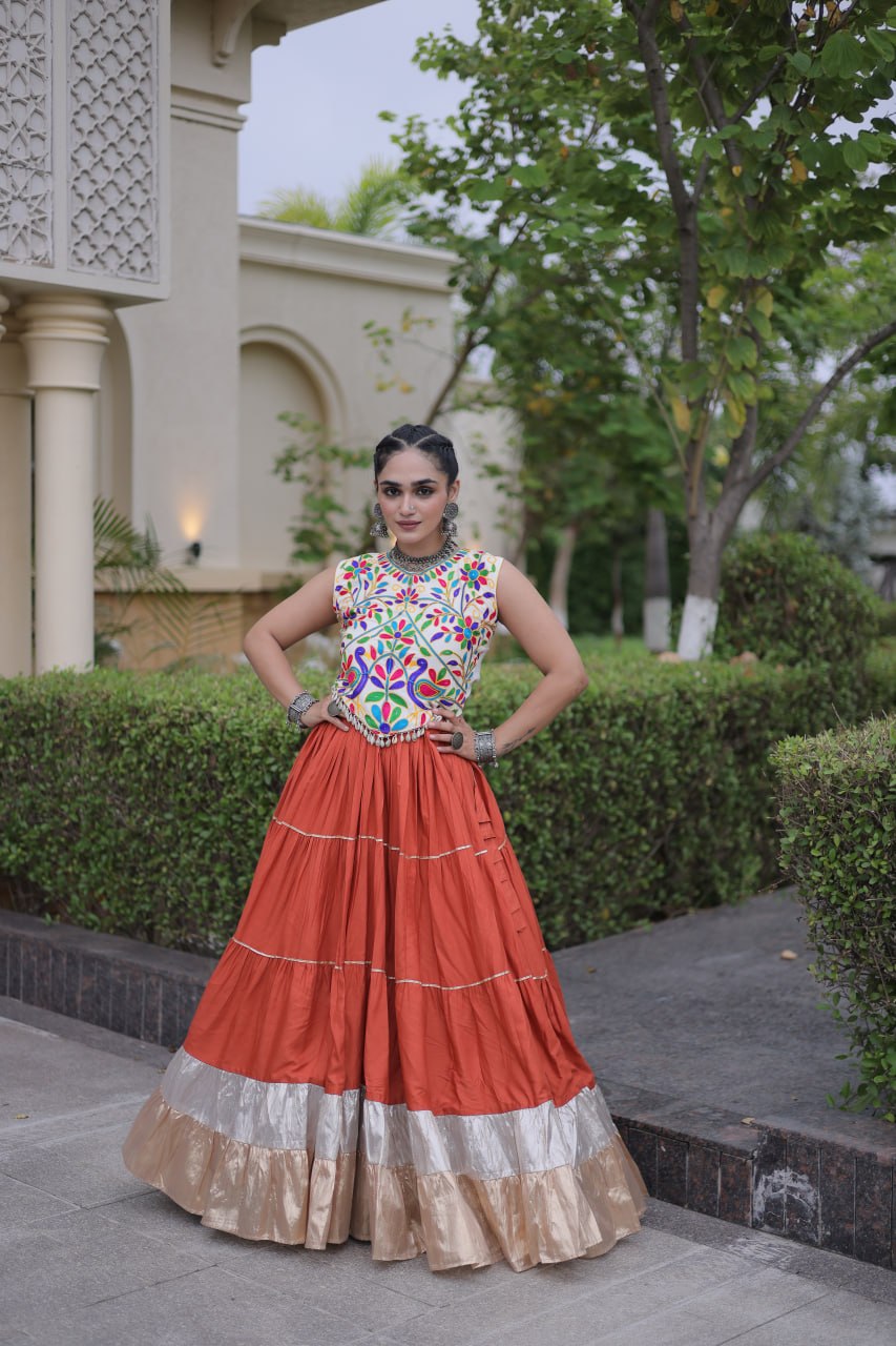 Terracotta Orange Kutchi Work Lehenga Choli with 12 Meter Flair