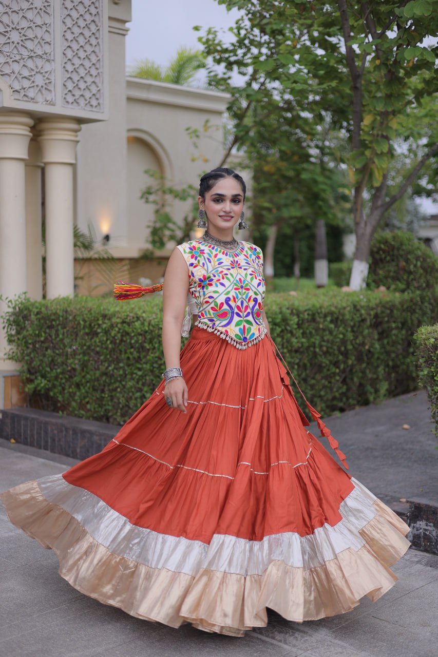 Terracotta Orange Kutchi Work Lehenga Choli with 12 Meter Flair