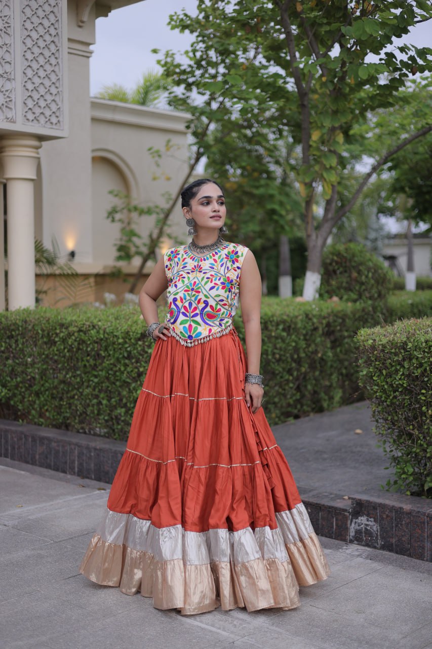 Terracotta Orange Kutchi Work Lehenga Choli with 12 Meter Flair