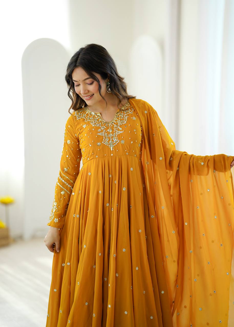 Mustard Yellow Faux Georgette Embroidered Gown with Pant & Dupatta Set