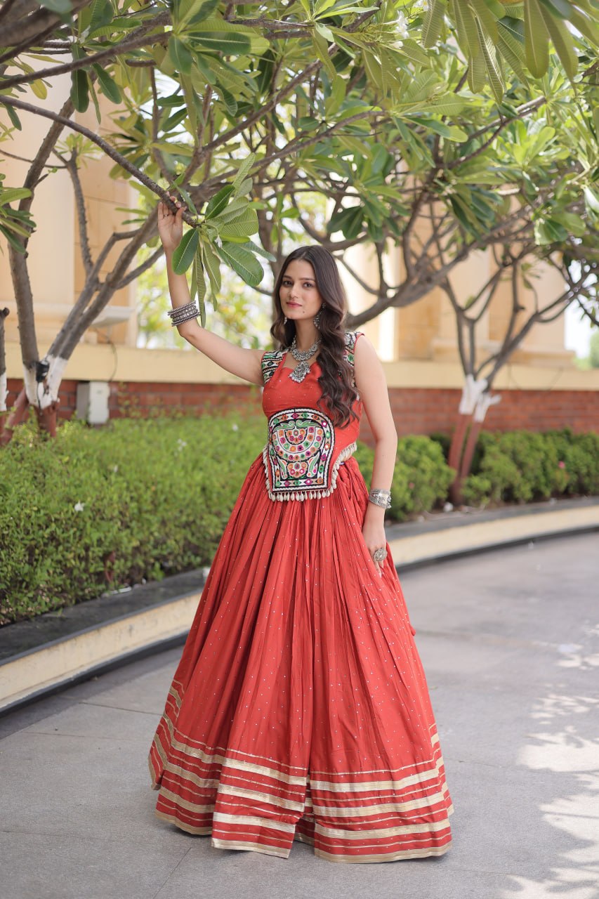 Coral Red Rayon Lehenga Choli with Mukesh & Gamthi Mirror Work
