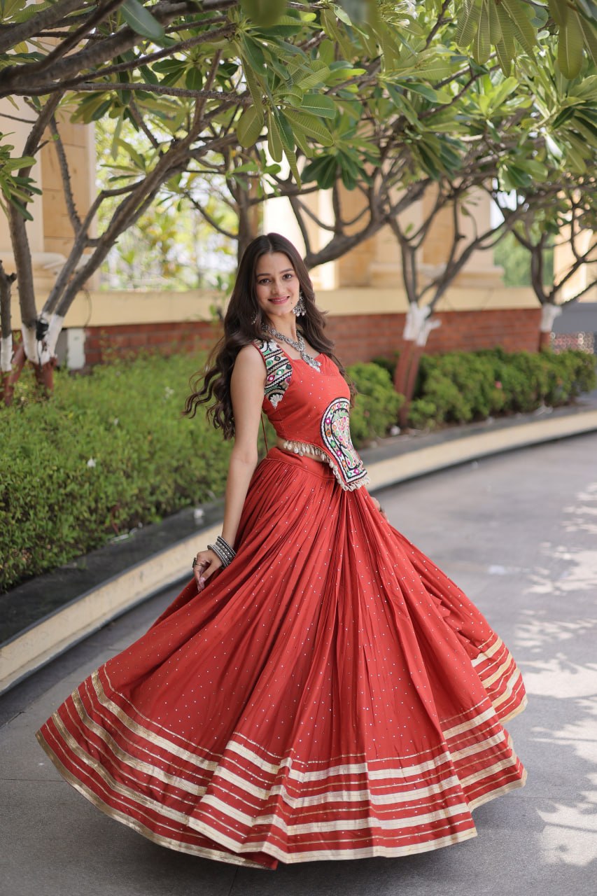Coral Red Rayon Lehenga Choli with Mukesh & Gamthi Mirror Work