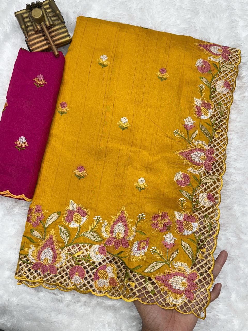 Mustard Yellow Visca Slub Silk Saree with Cutwork Embroidery and Rani Pink Blouse