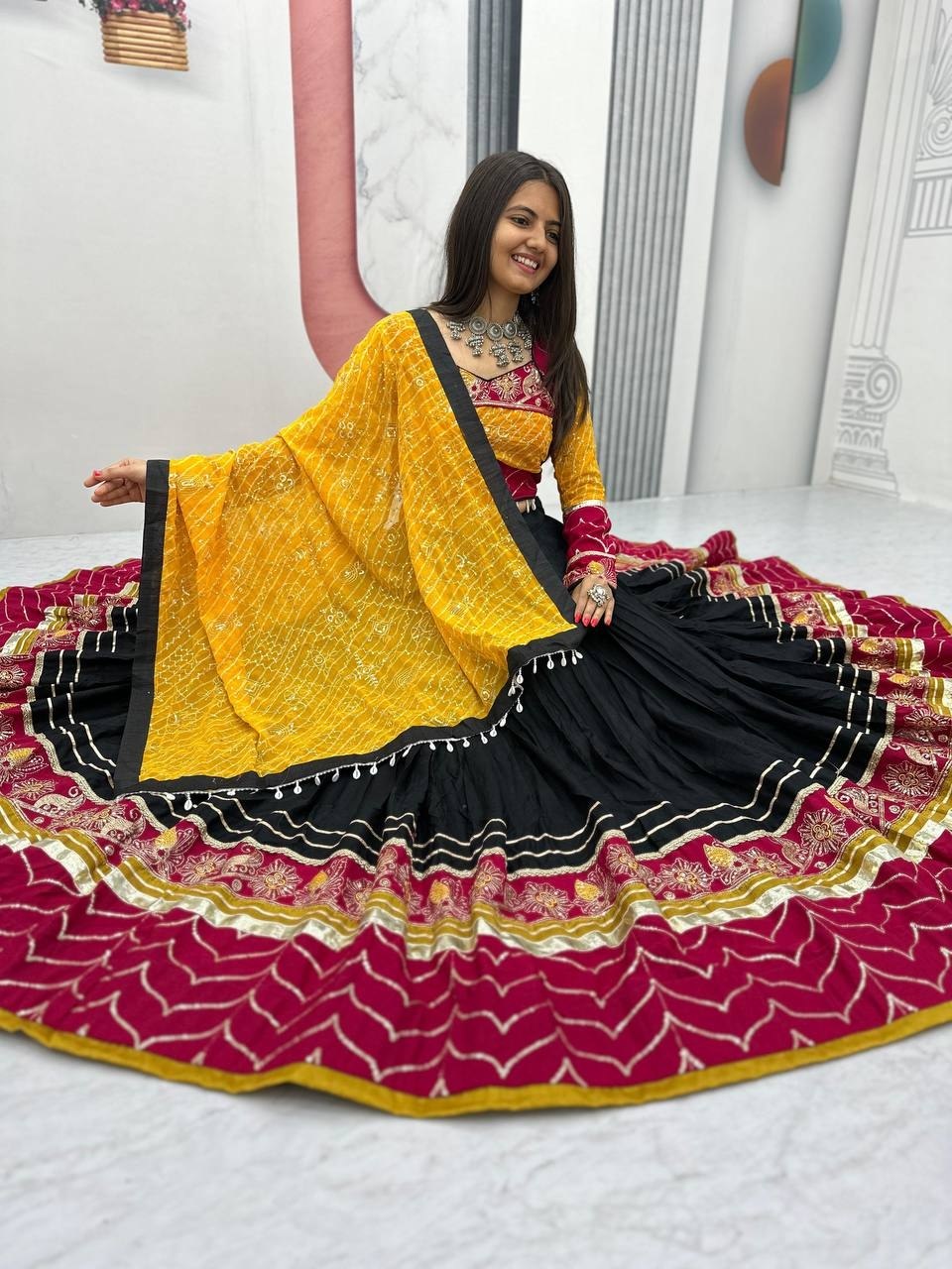 Black, Mustard Yellow & Wine Riyon Cotton Navratri Lehenga Choli with Embroidered Dupatta