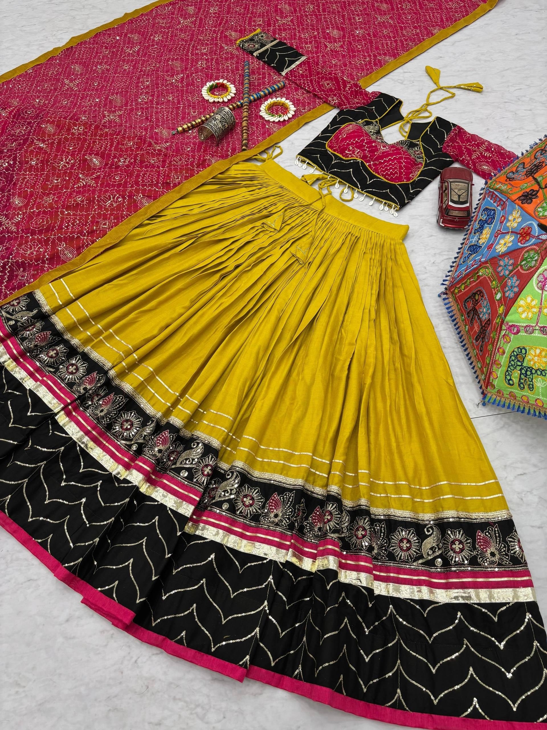 Mustard Yellow, Black & Rani Pink Riyon Cotton Navratri Lehenga Choli with Embroidered Dupatta