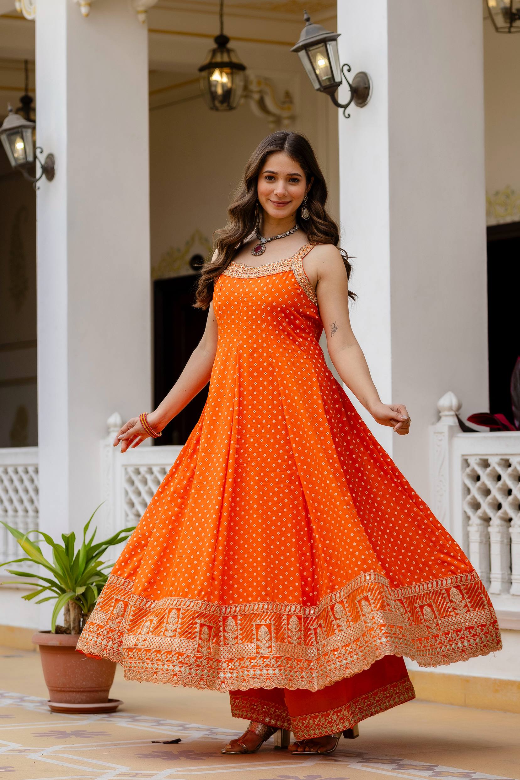 Bright Orange Bandhani Vichitra Silk Embroidered Gown Set with Real Mirror Work & Leheriya Dupatta