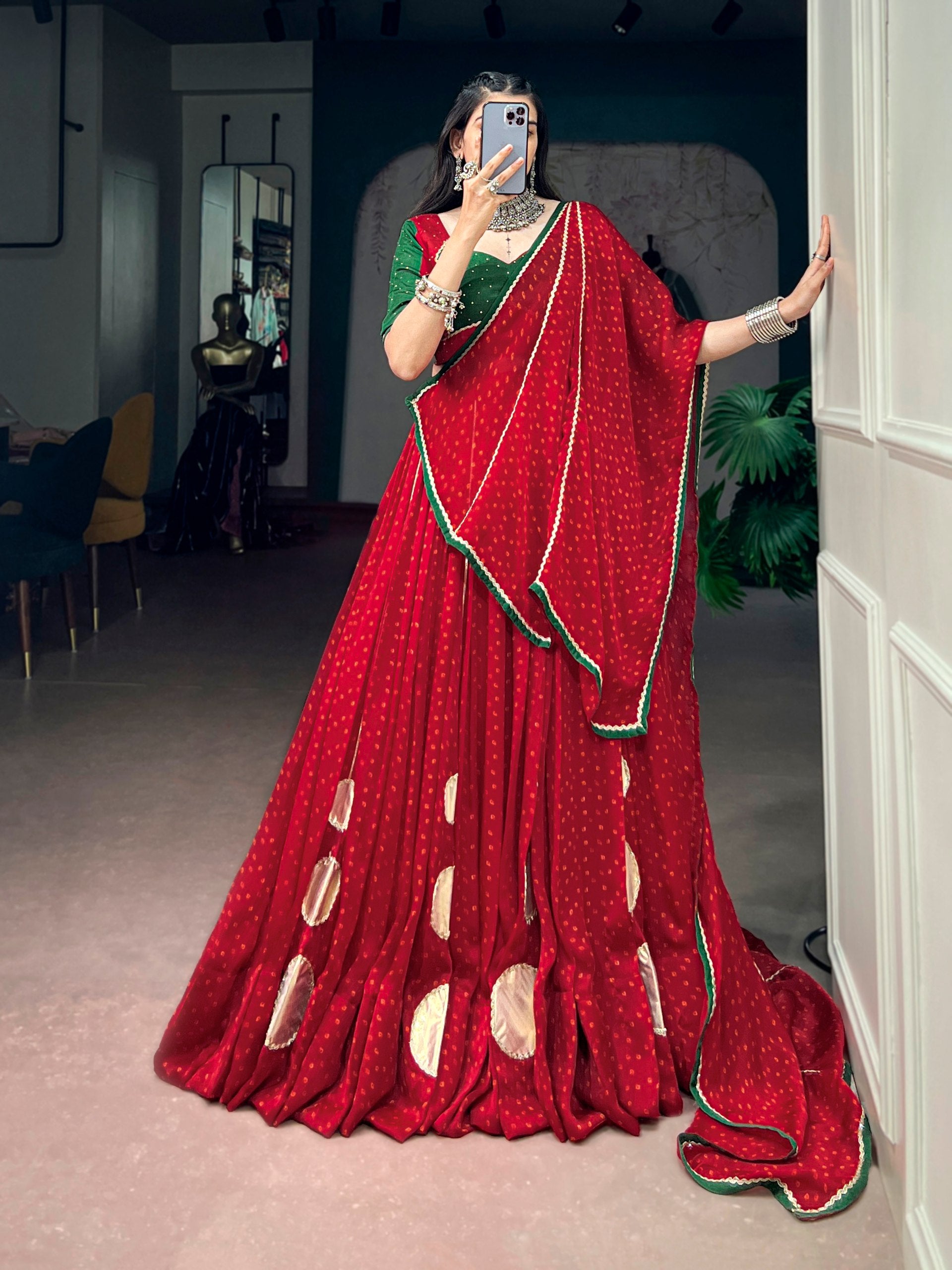 Ruby Red Bandhej Print Navratri Lehenga Choli with Emerald Green Dola Silk Blouse | 7.5 Meter Flair
