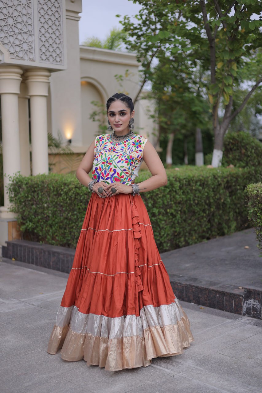 Terracotta Orange Kutchi Work Lehenga Choli with 12 Meter Flair