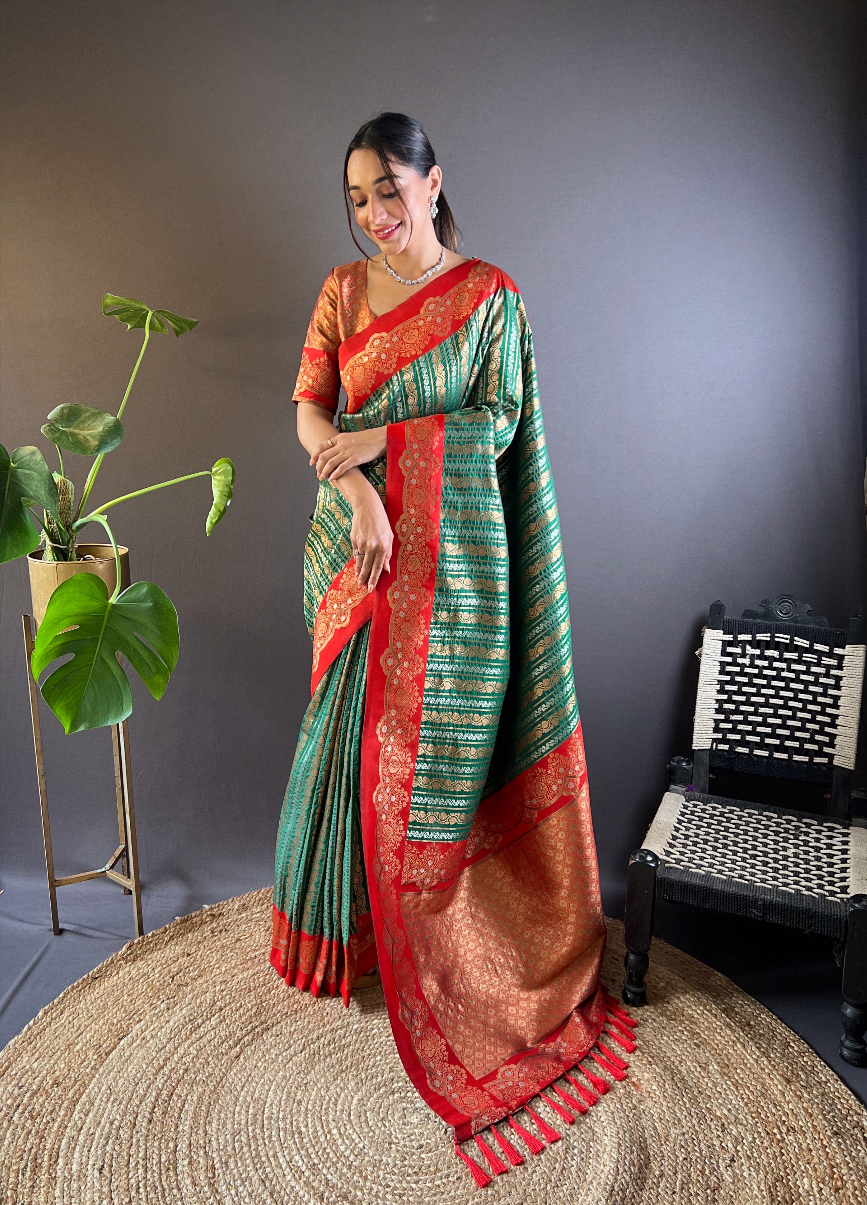 Bottle Green Soft Silk Zari Woven Partywear Saree