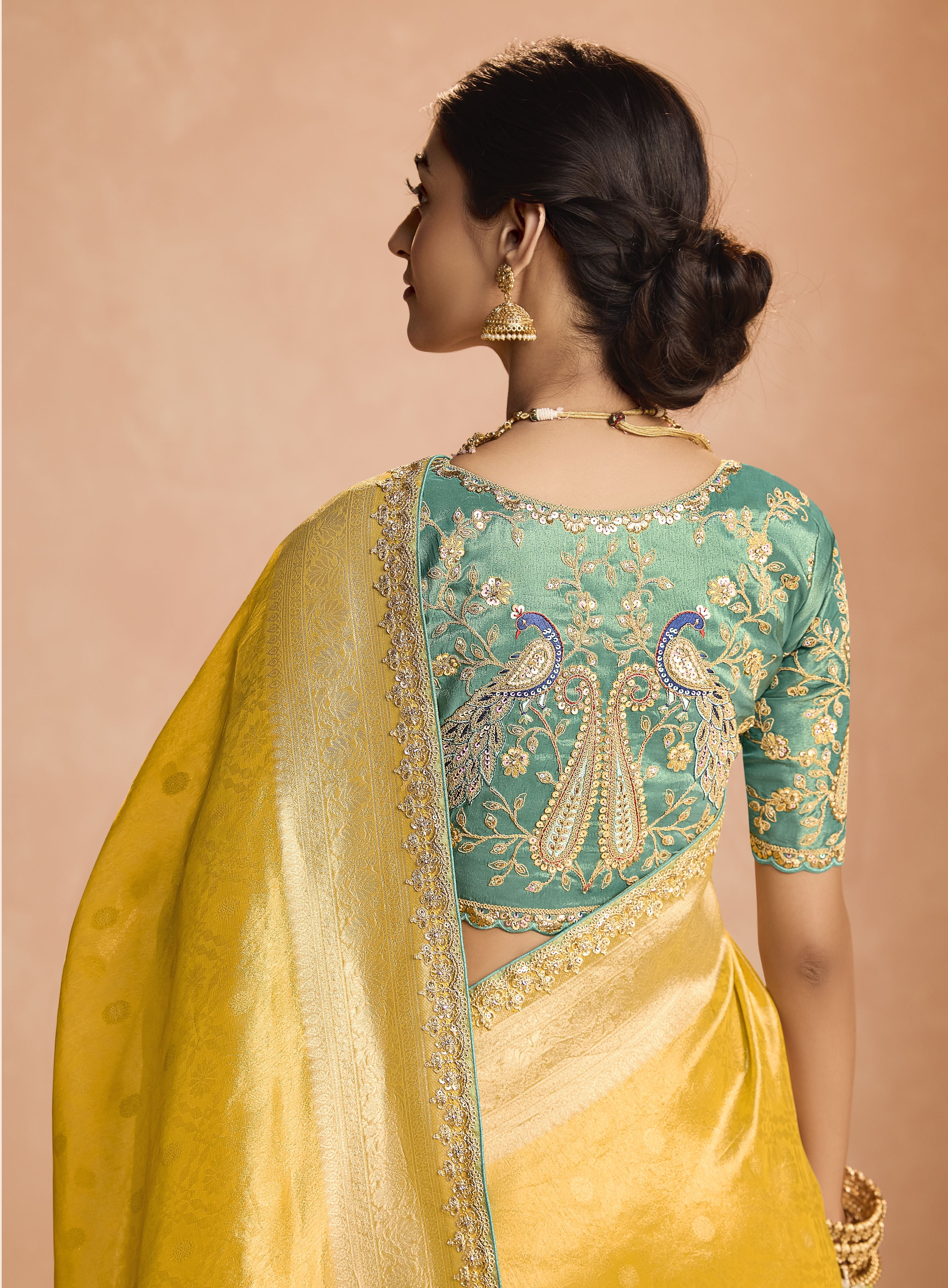 Yellow Heavy Embroidery Party Wear Silk Saree