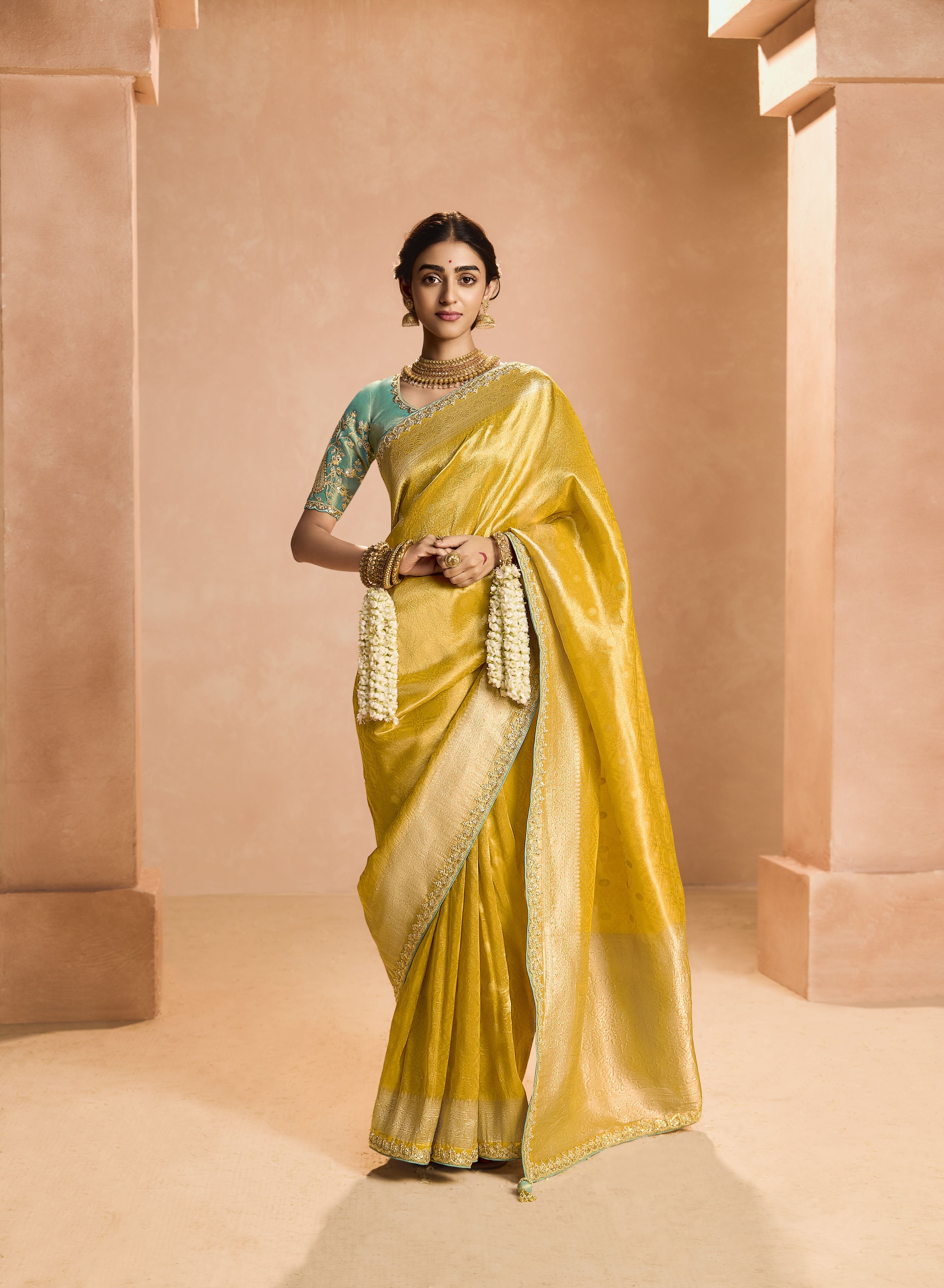 Yellow Heavy Embroidery Party Wear Silk Saree